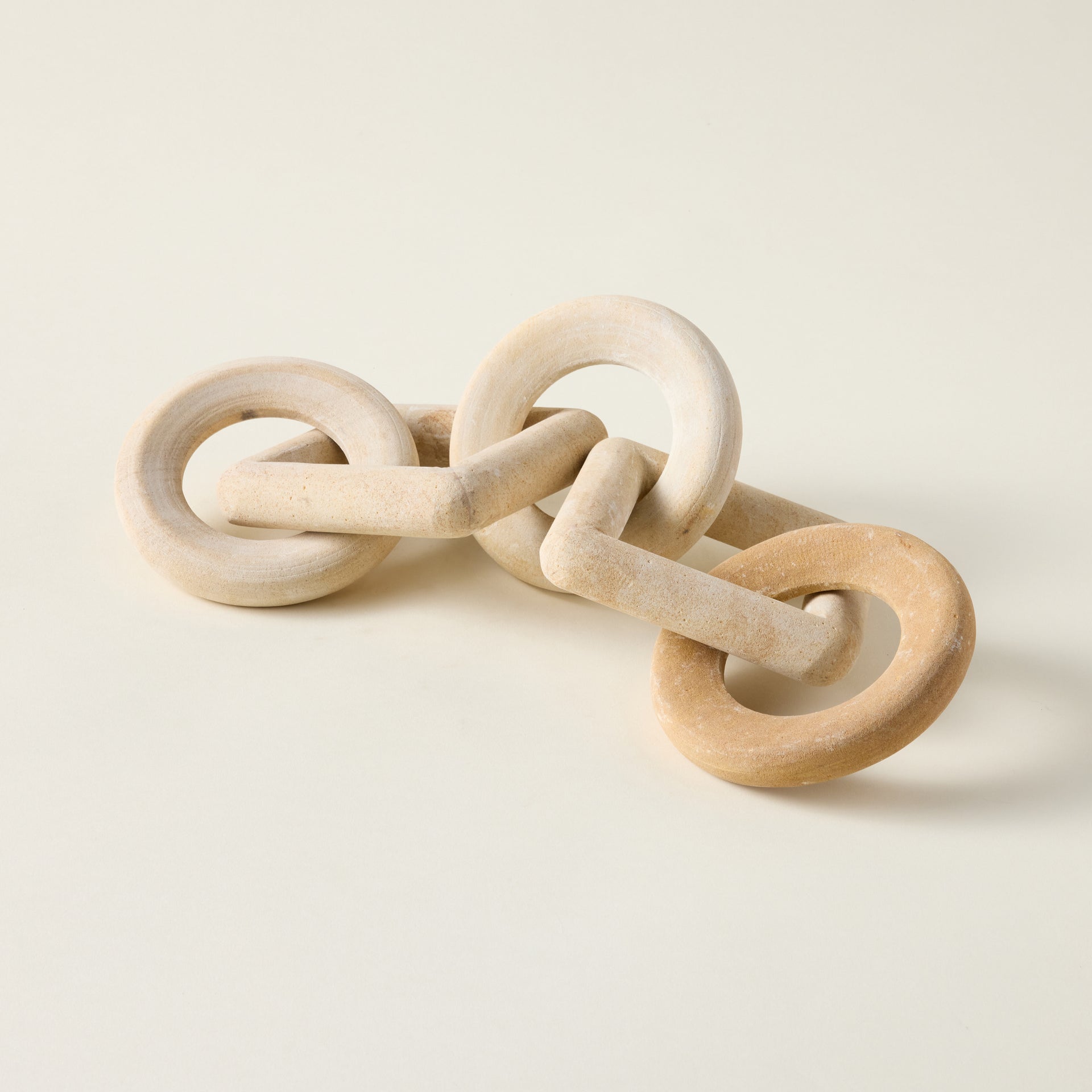 Carved sandstone decorative chain.