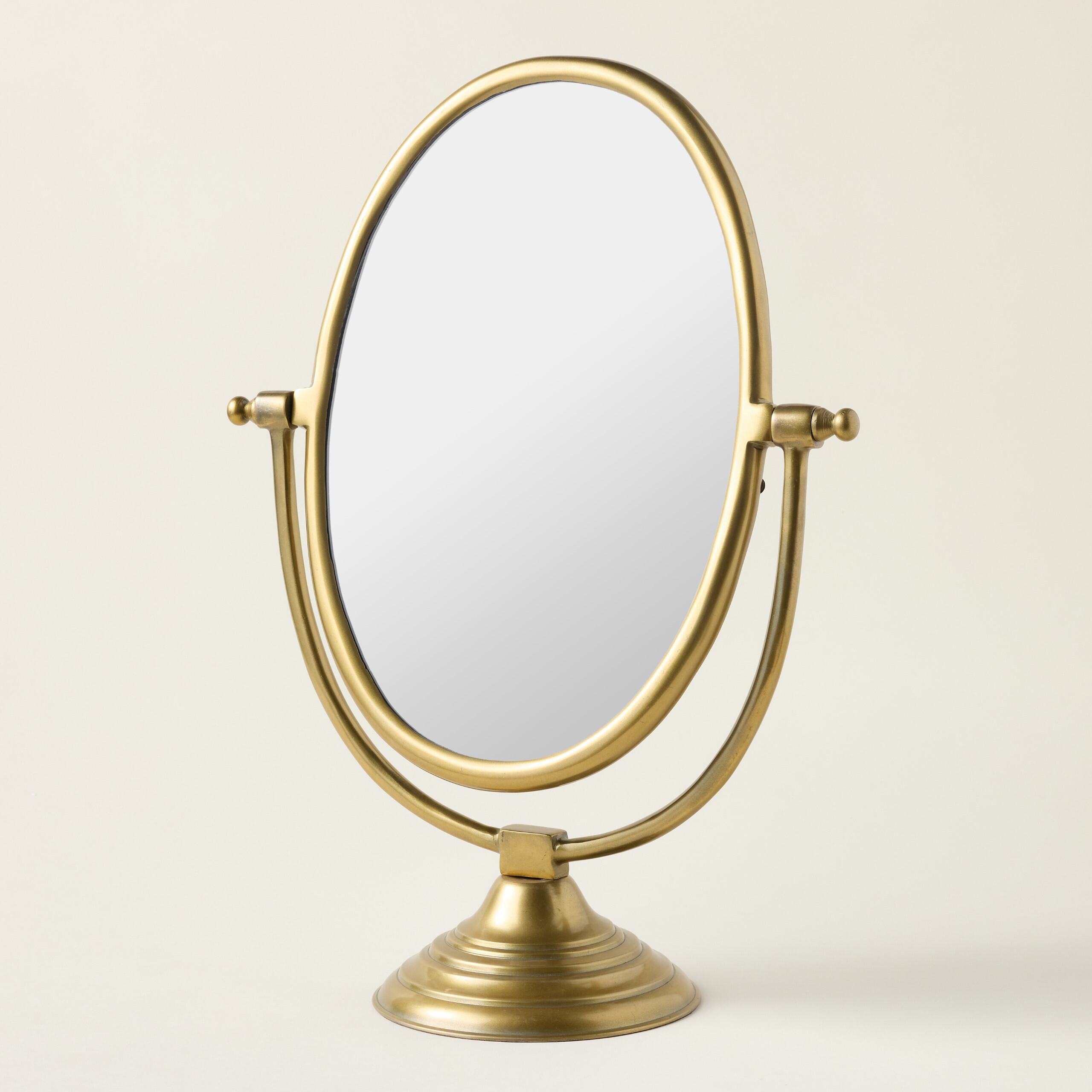 Vintage-inspired standing mirror with a durable frame and a unique antique brass finish.