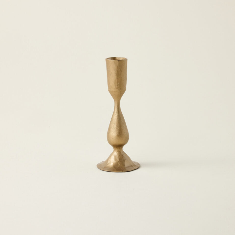 Hand-forged metal taper candle holder.