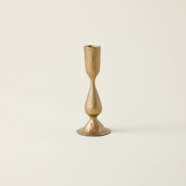 Hand-forged metal taper candle holder.