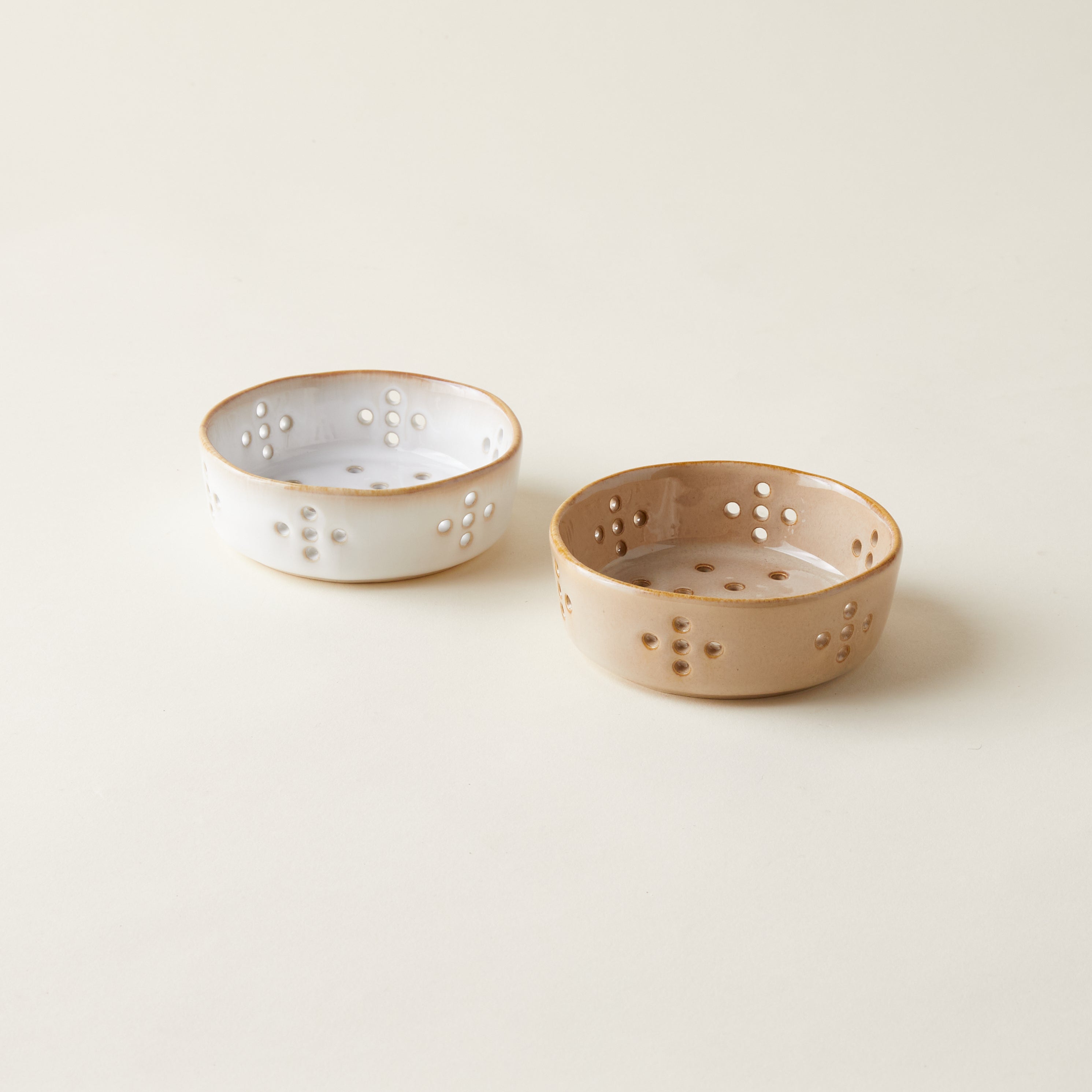 Handcrafted stoneware berry bowl with an organic shape and a unique reactive glaze finish.
