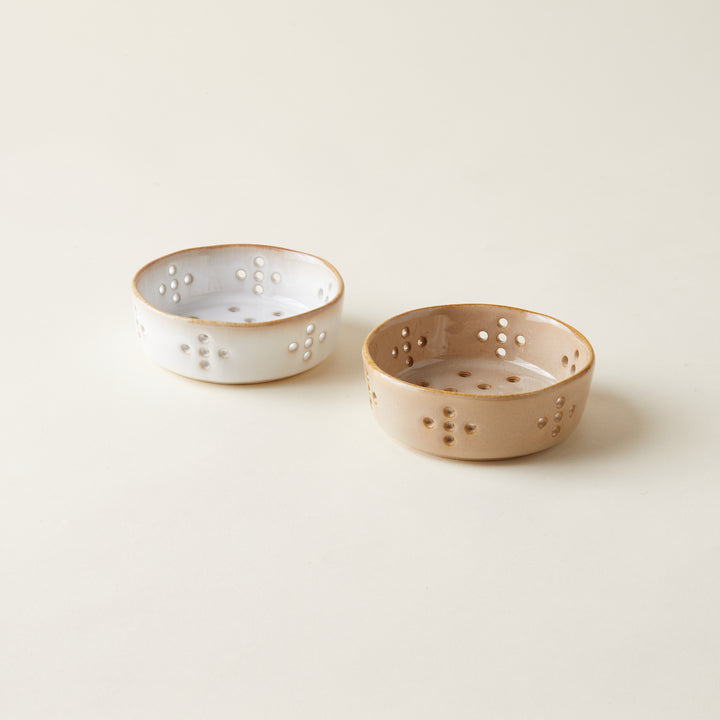 Handcrafted stoneware berry bowl with an organic shape and a unique reactive glaze finish.