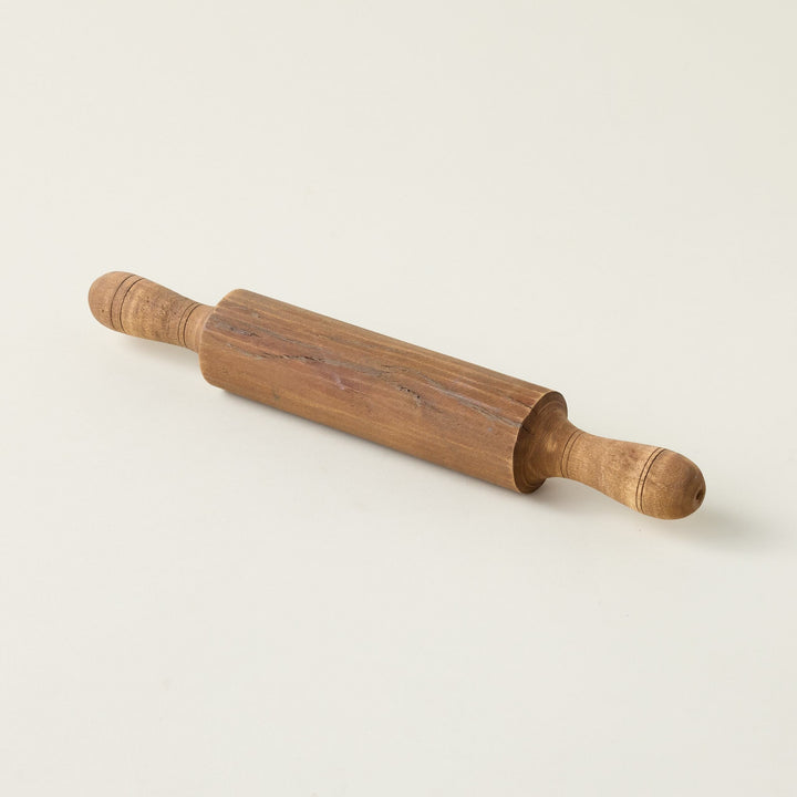 Vintage found chapati roller with distressed wood and a rustic, authentic look.