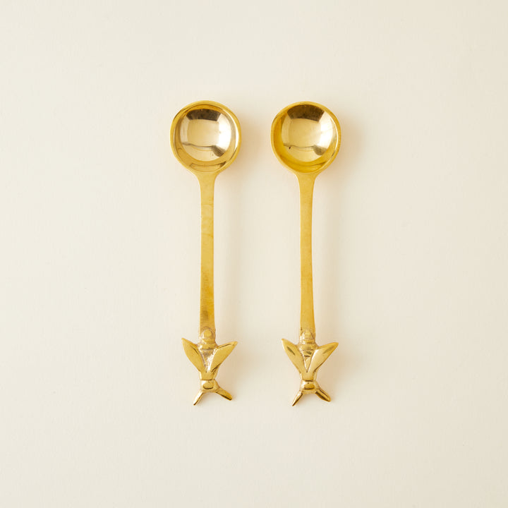 Set of two gold bee spoons, 5 inches long, for honey or sugar.
