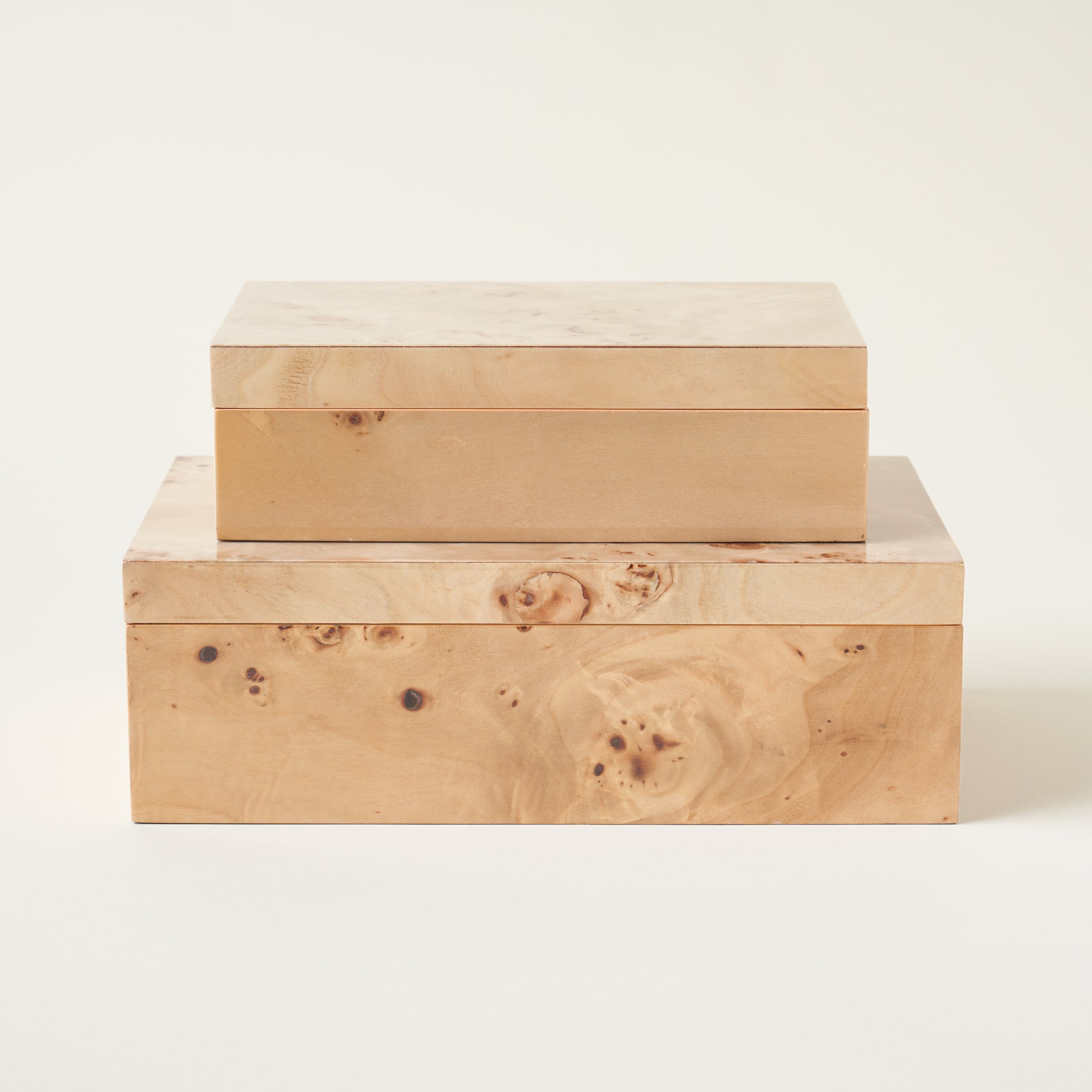 Sculptural burl wood hinge box with a unique grain pattern.