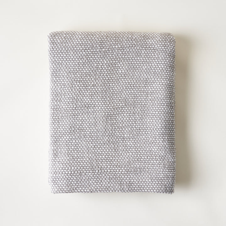 Charlotte bed blanket crafted from lightweight, breathable cotton.