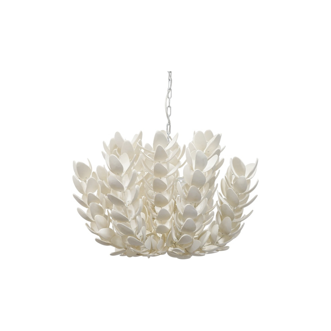 A pendant light with a shade made of hand-cut coco shell petals.