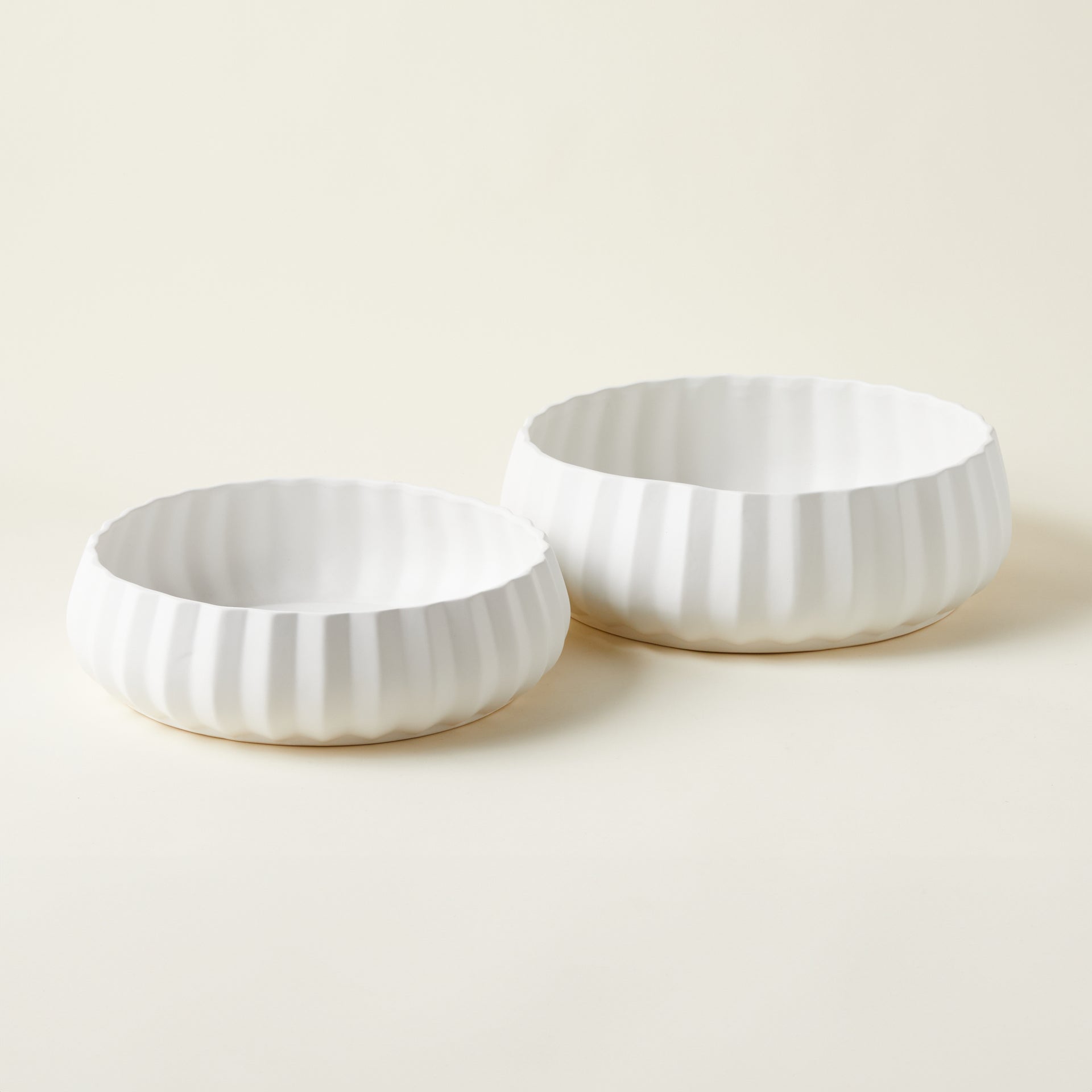 Set of two Frisco clay vases in different sizes.