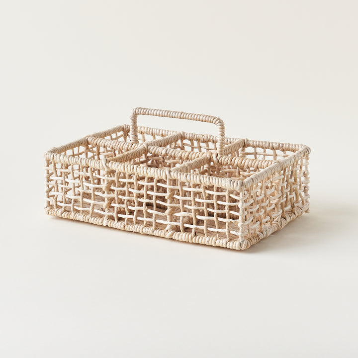 A glassware caddy made from hand-twisted and bleached banana bark rope.