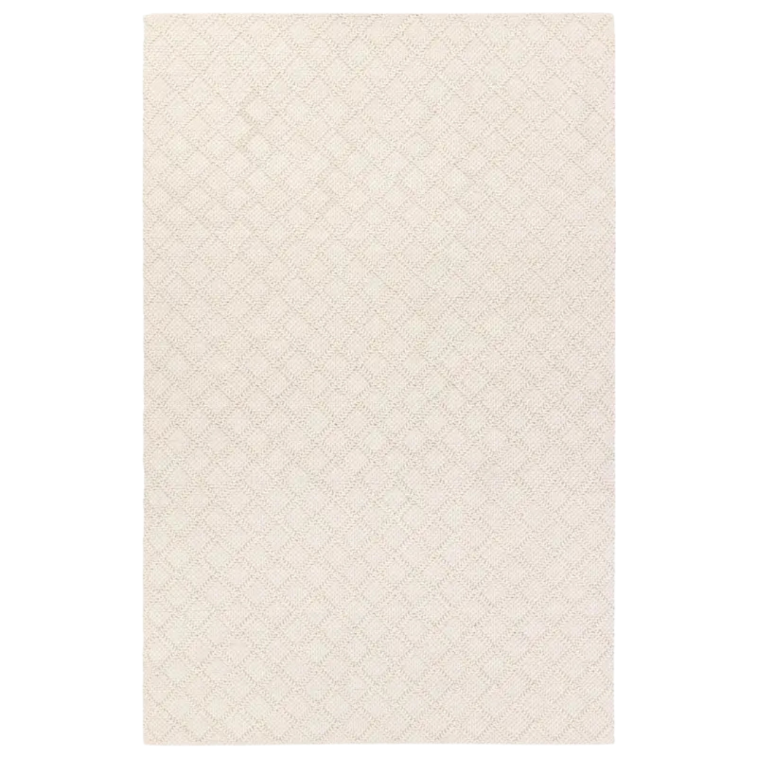 Ethically crafted handwoven rug with a lattice motif and a soft feel.