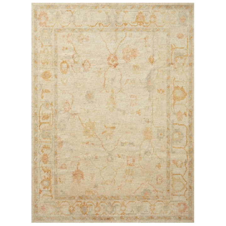 Hand-knotted Clement Rug crafted from 100% wool pile with a classic motif.