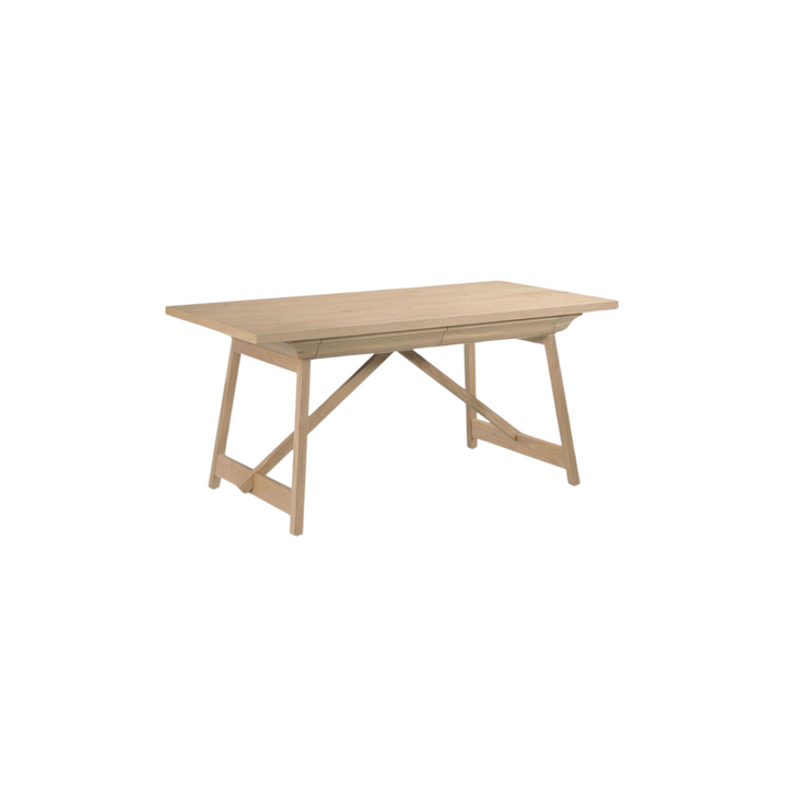 The Lana Desk, with angled legs and a single drawer, embodying an Arts and Crafts design.