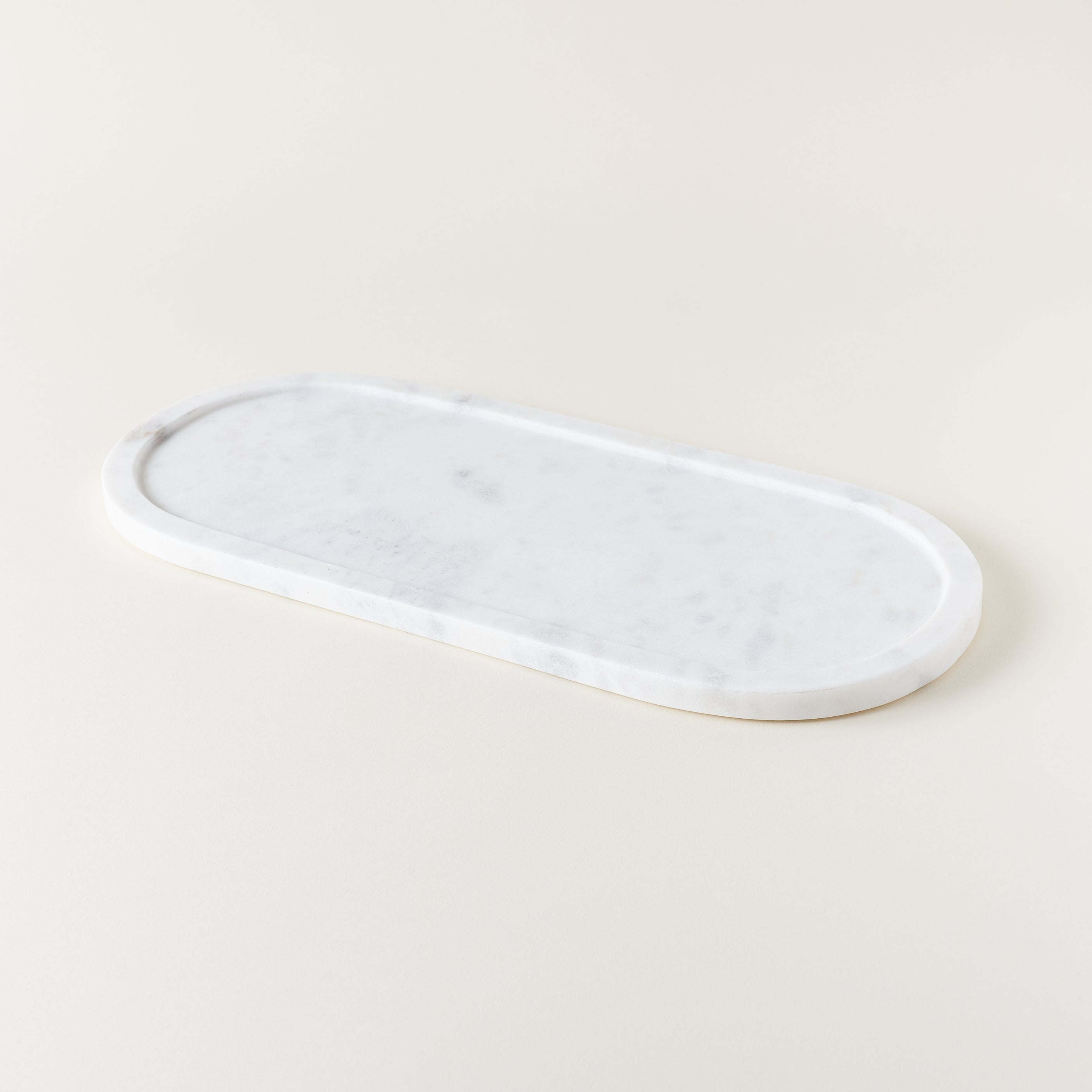 Lori oval tray crafted from natural marble.