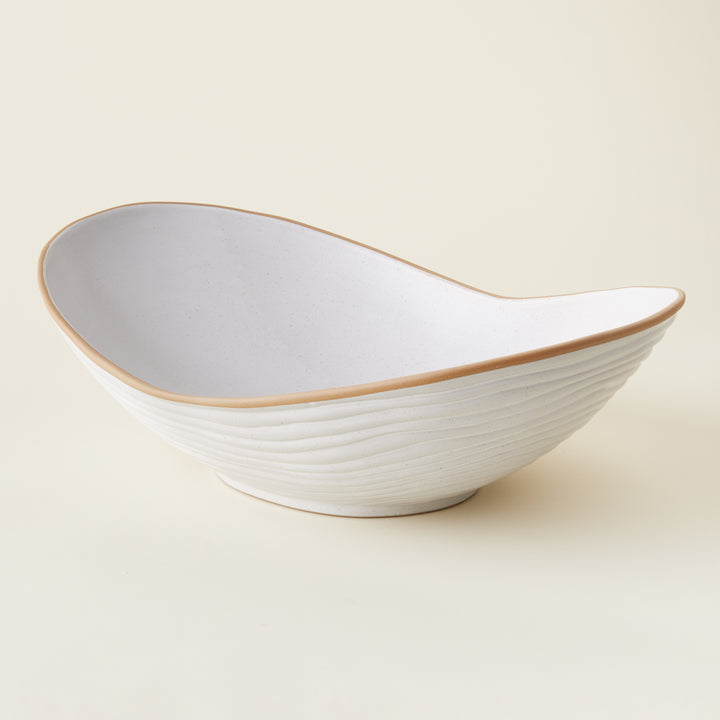 Monte Bowl, matte white with speckled clay and brown bisque edges.
