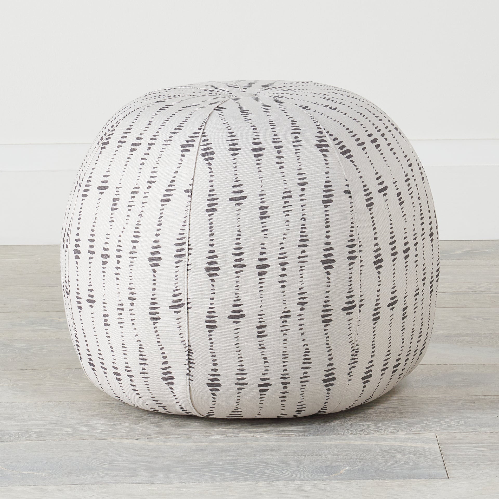Myla Coal Pouf with KMH upholstery and an exclusive Myla pattern.