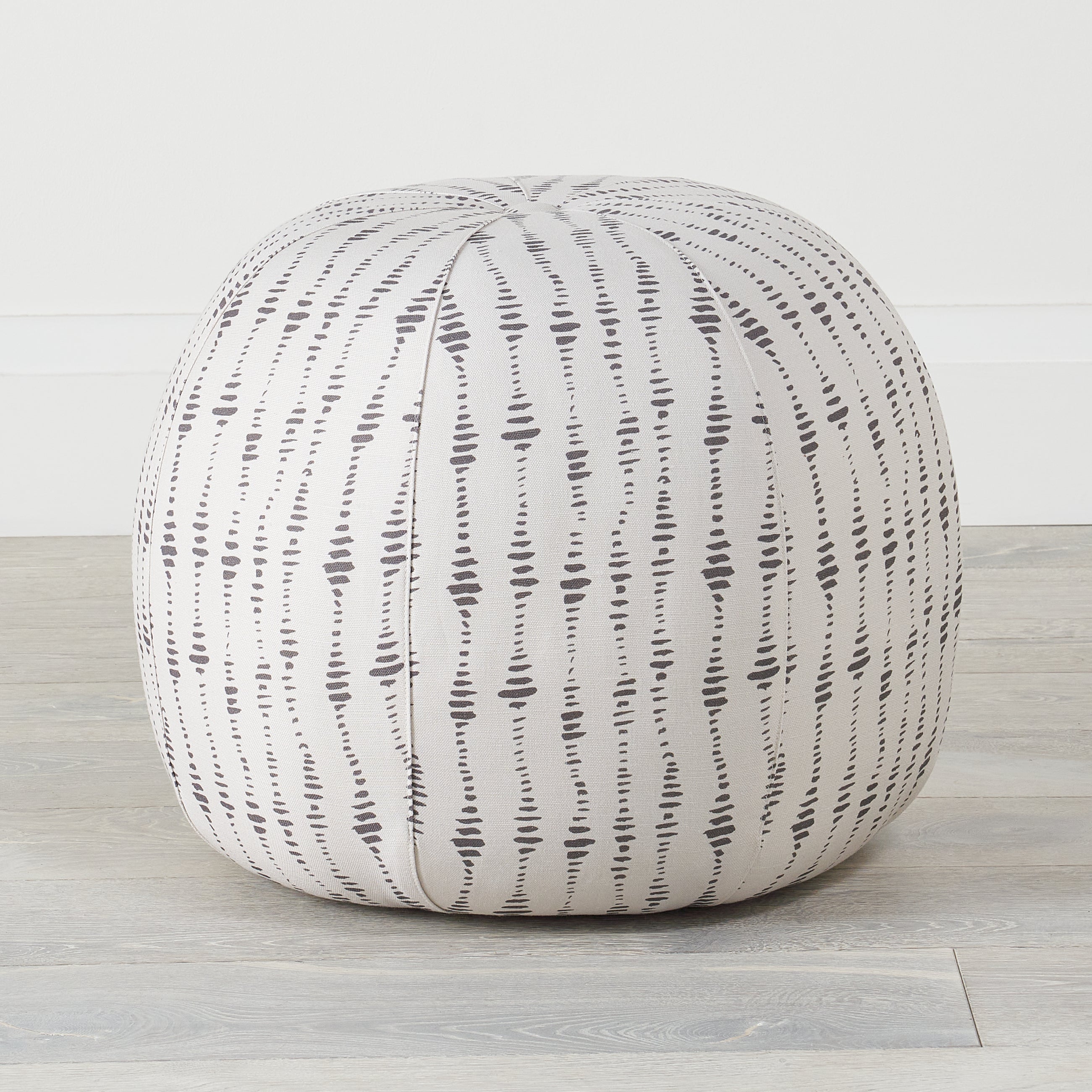 Myla Coal Pouf with KMH upholstery and an exclusive Myla pattern.