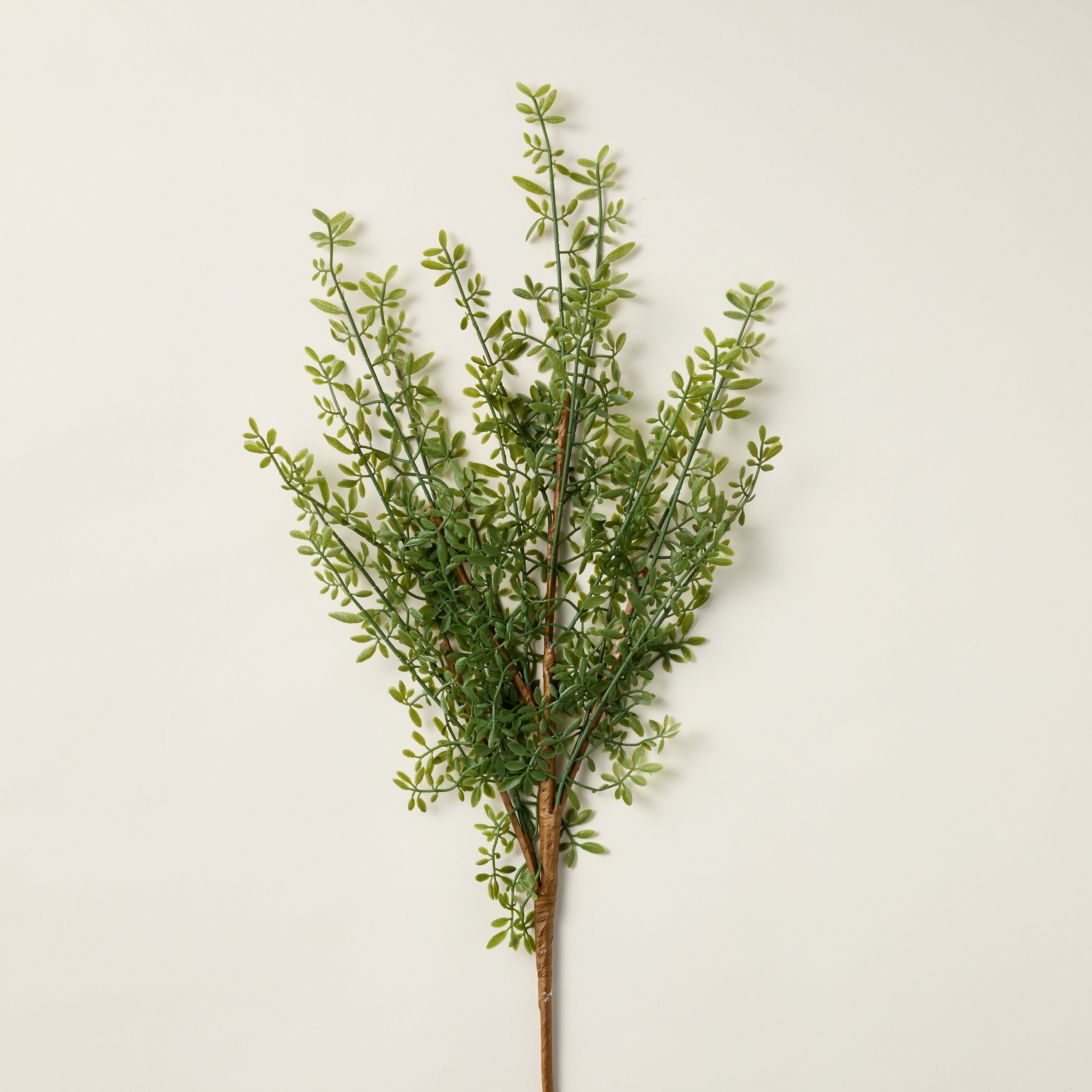Faux myrtle leaf branch with lifelike "Real Touch" texture and vibrant green color.