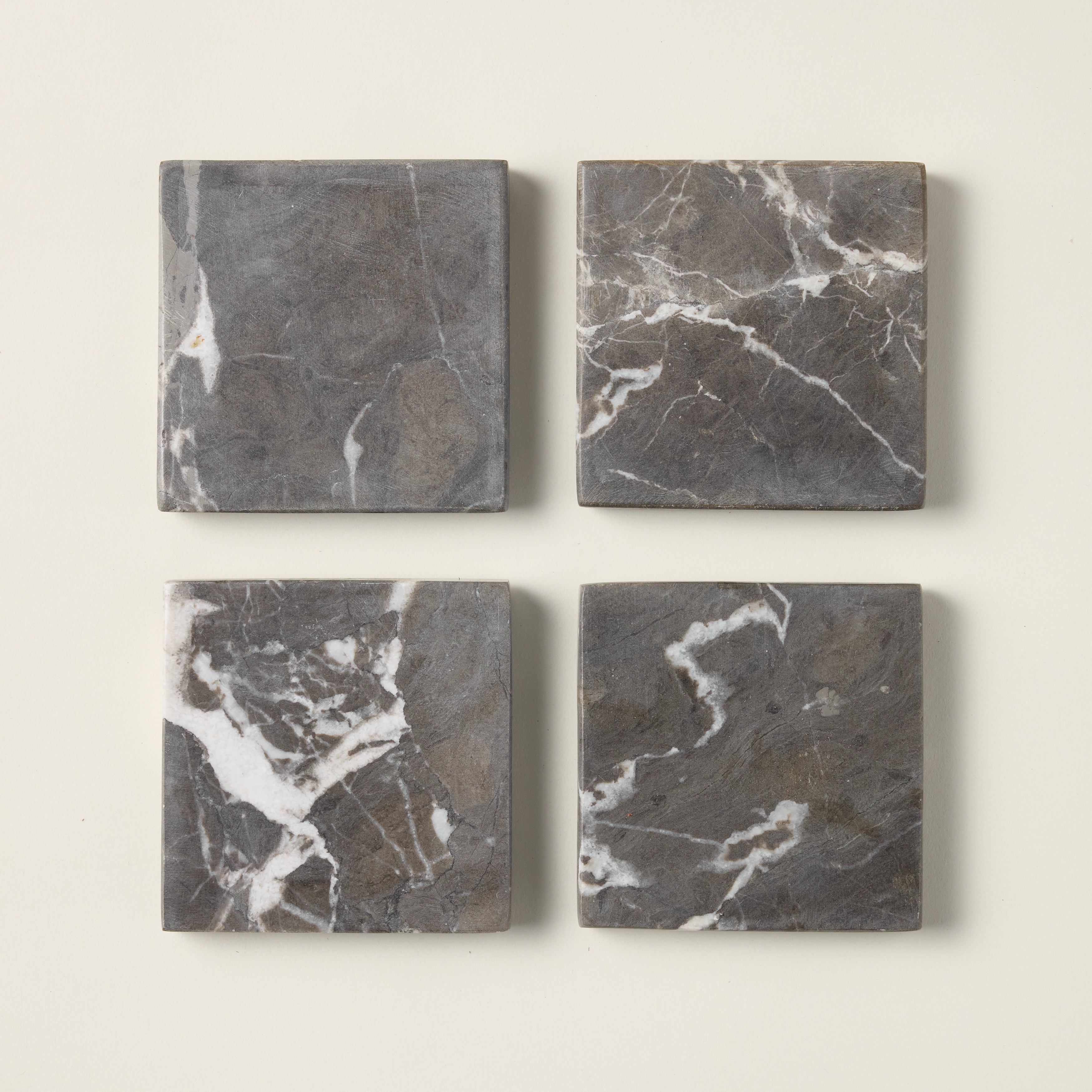 Set of ocean-inspired coasters with an artisanal design and organic texture.
