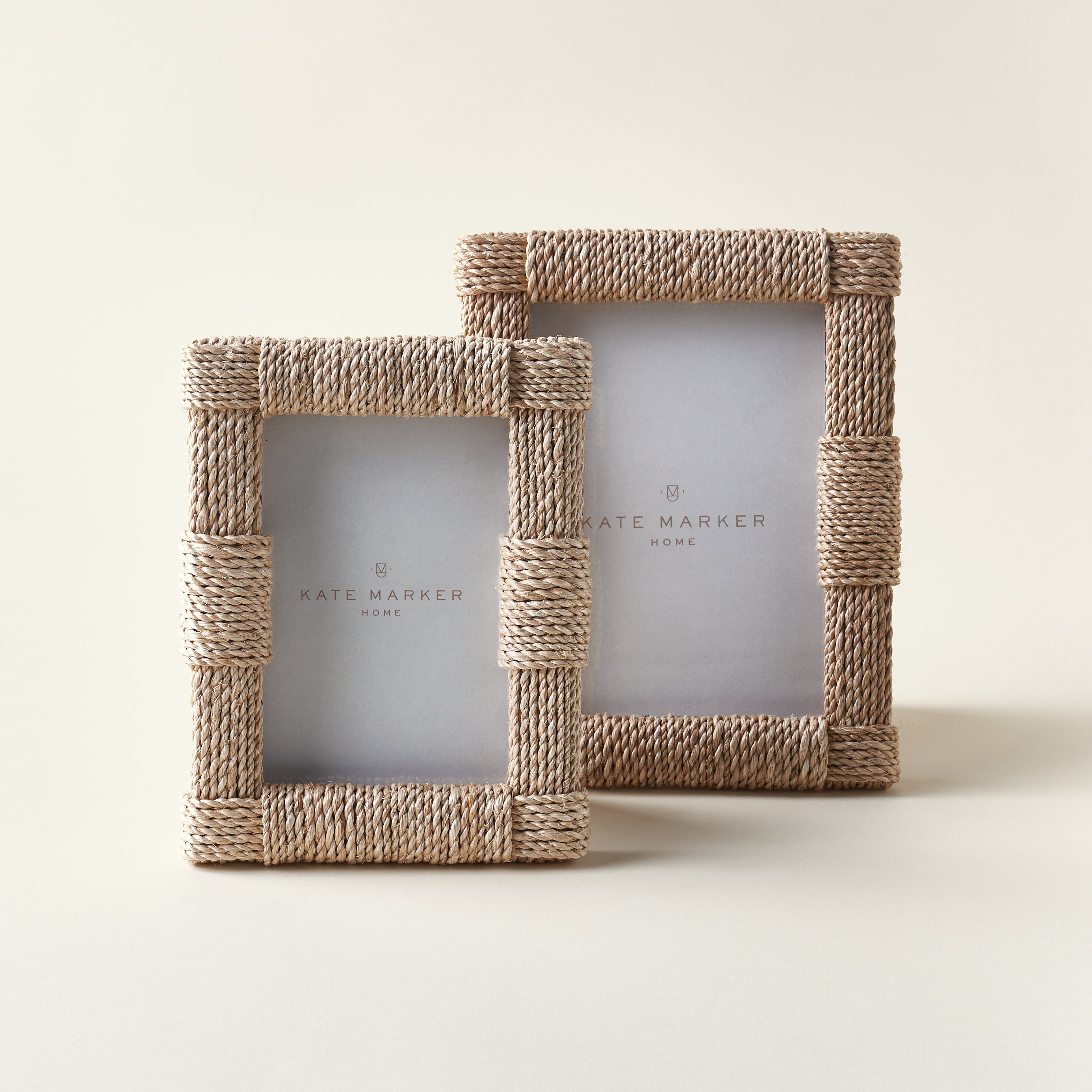 A set of two decorative photo frames in different sizes, both wrapped in a natural abaca rope texture.