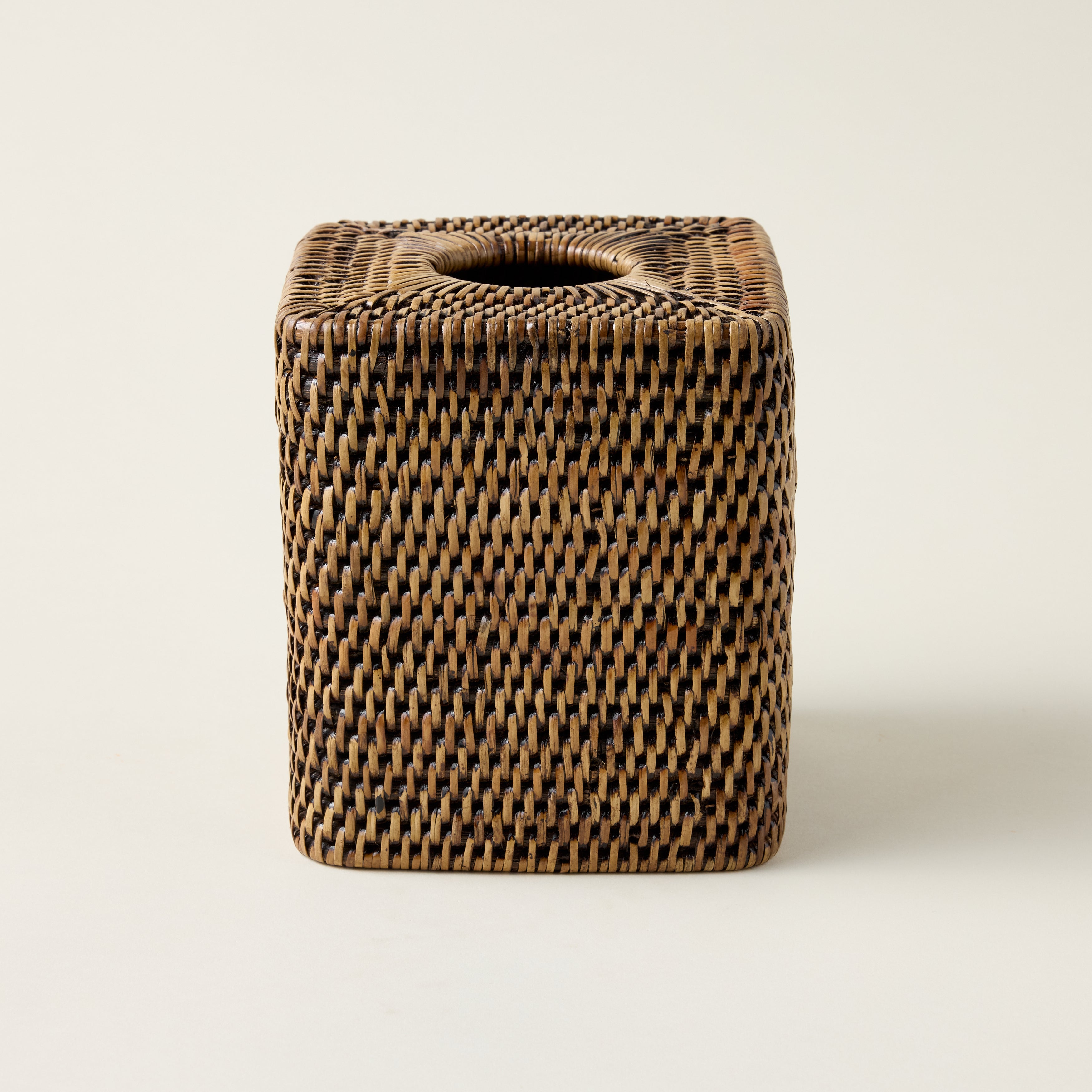 Hand-woven rattan tissue cover with a natural woven texture and a clean, elegant design.