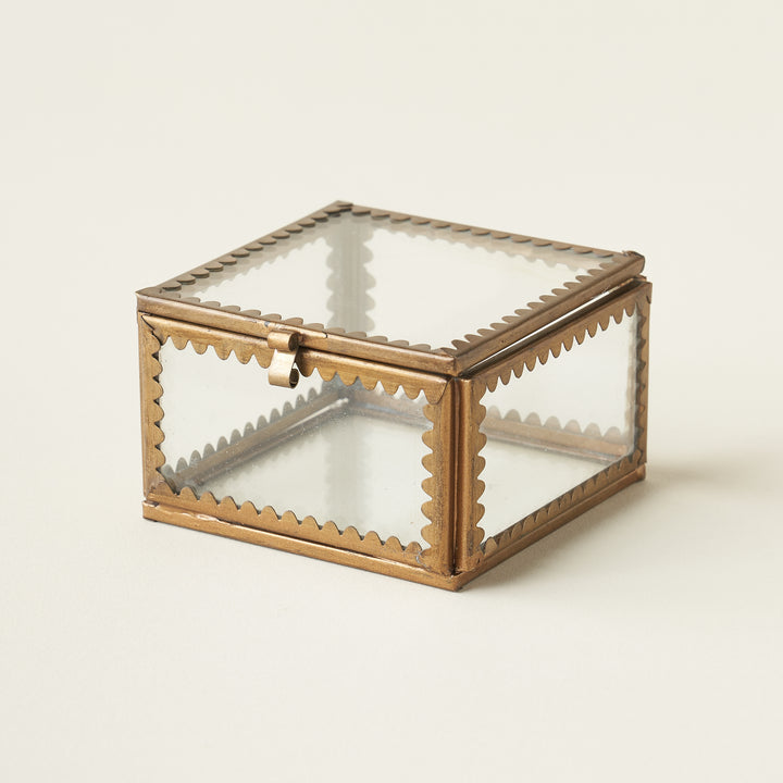 Scalloped brass and glass display box with a unique scalloped edge and a timeless, elegant design.