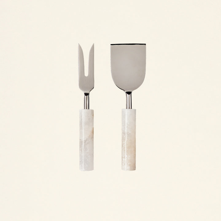 Set of two cheese tools with handles sculpted from Portuguese alabaster.