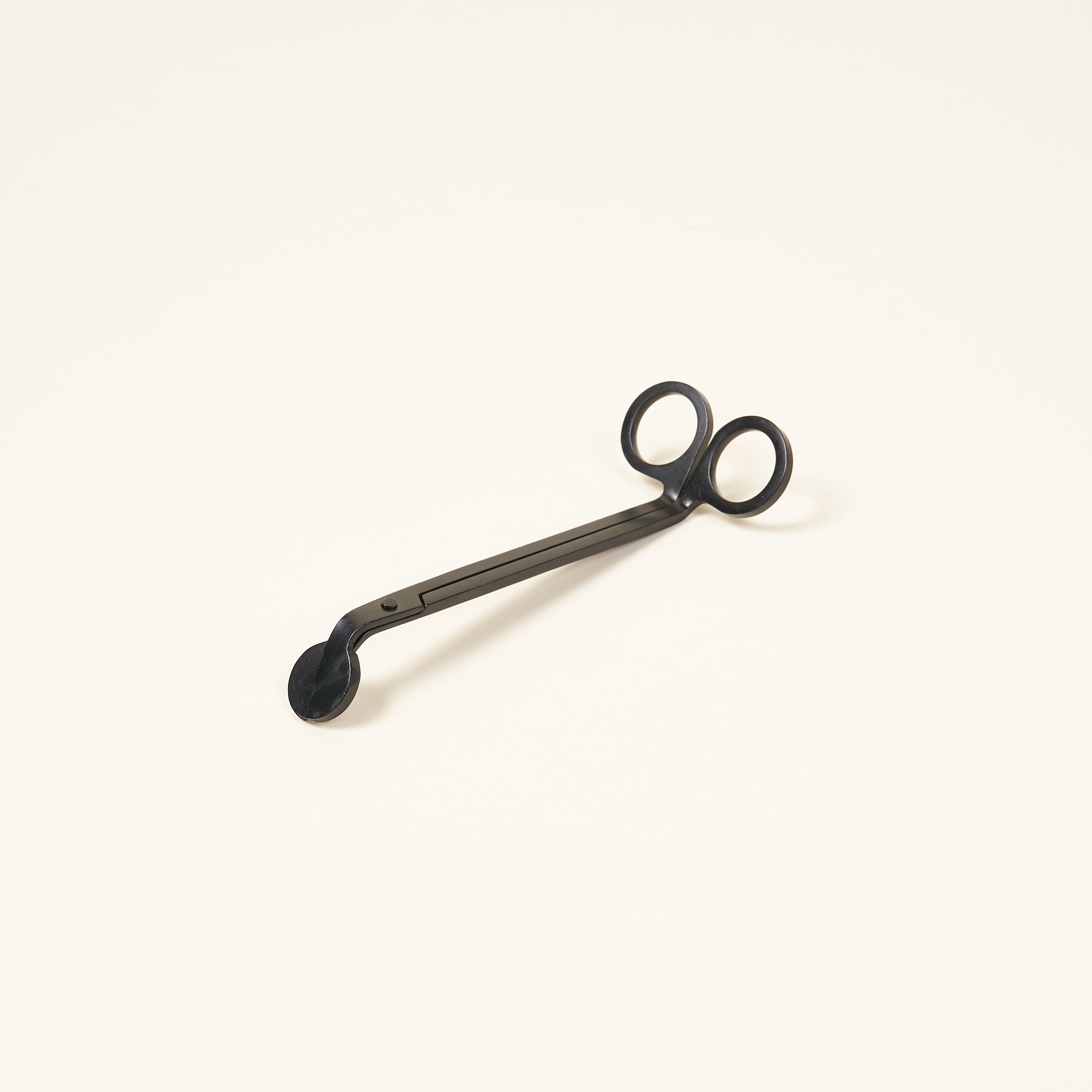 Matte black wick trimmers for candles.