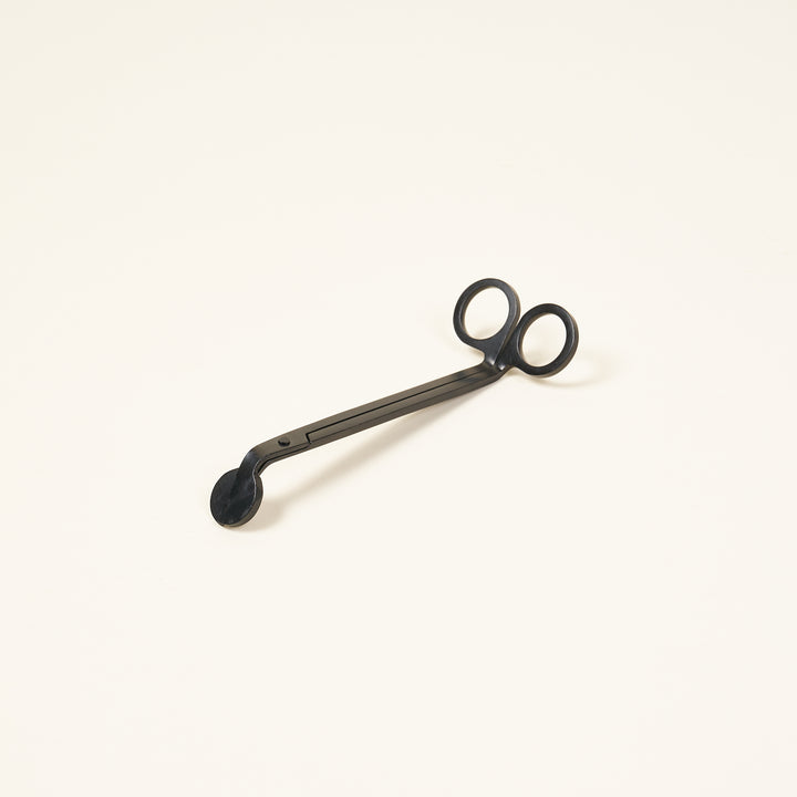 Matte black wick trimmers for candles.