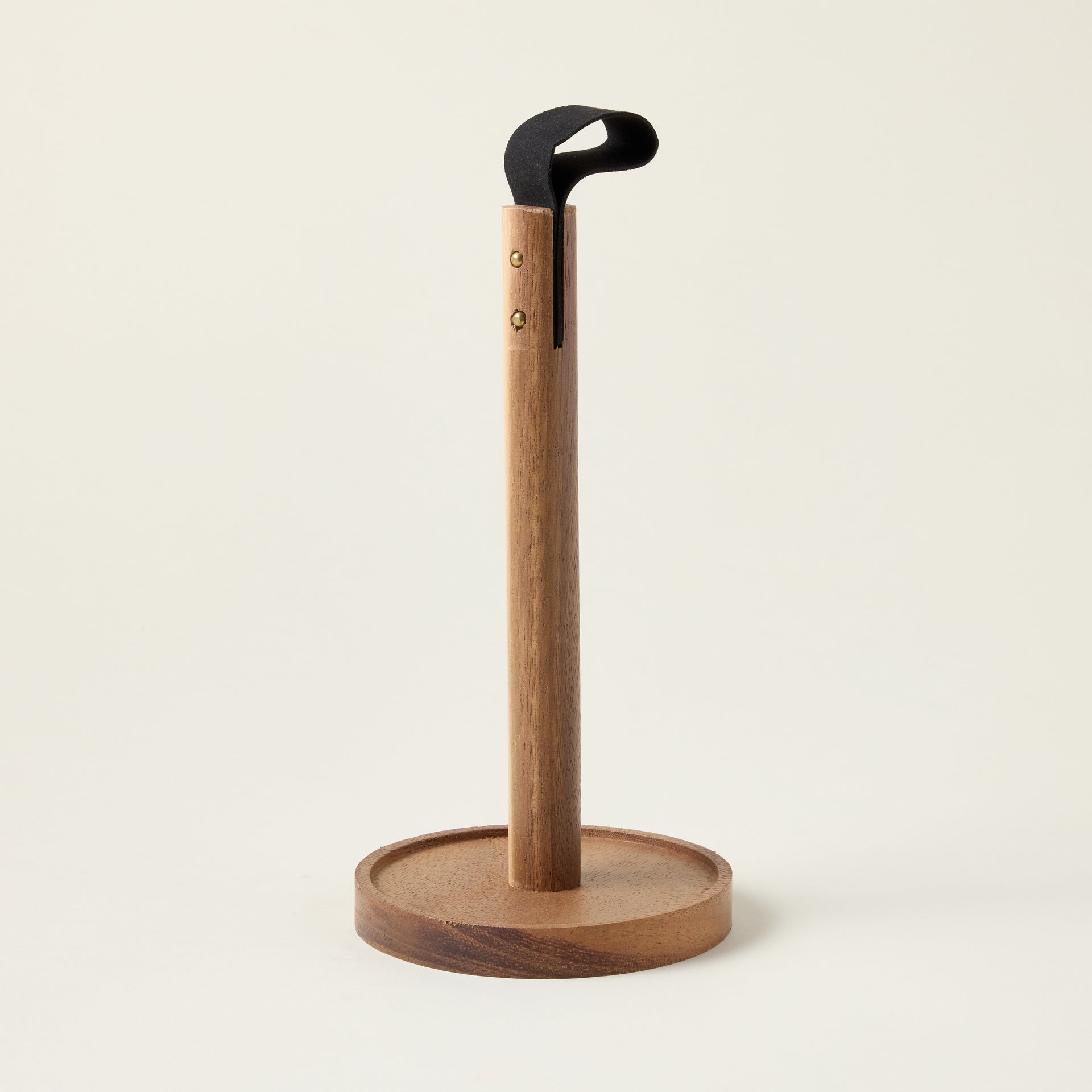 Sleek acacia wood paper towel holder with a natural wood grain and a refined, stylish design.