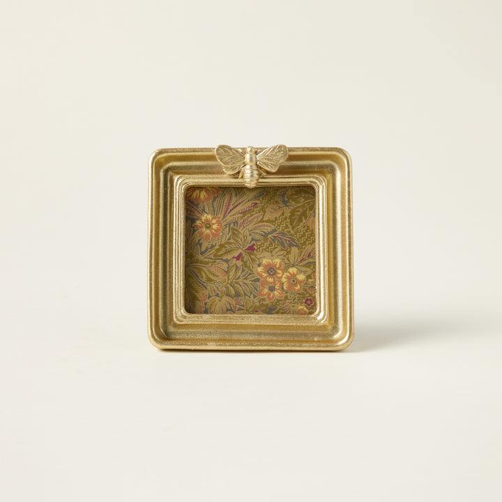 Gold bee photo frame with a sculptural bee design and an elegant, vintage-inspired finish.