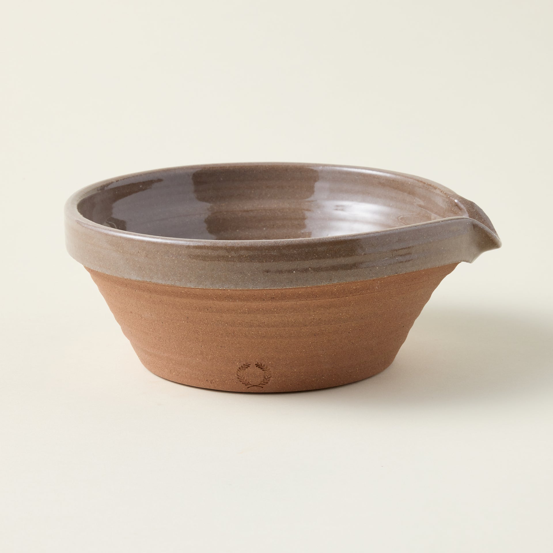 Handcrafted French Country mixing bowl in a flax finish with a practical pour spout.