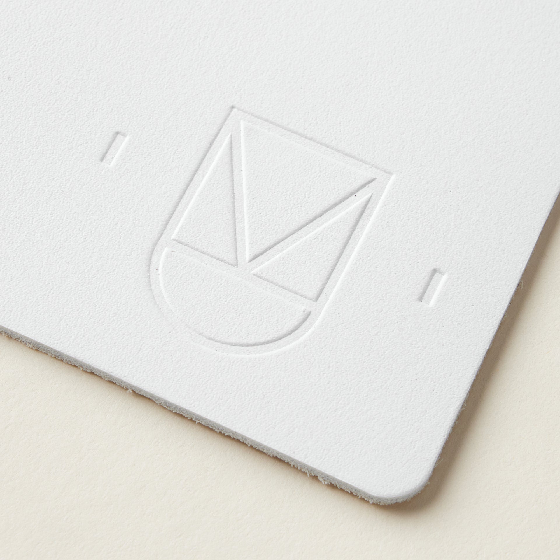 KMI White Leather Coasters Set