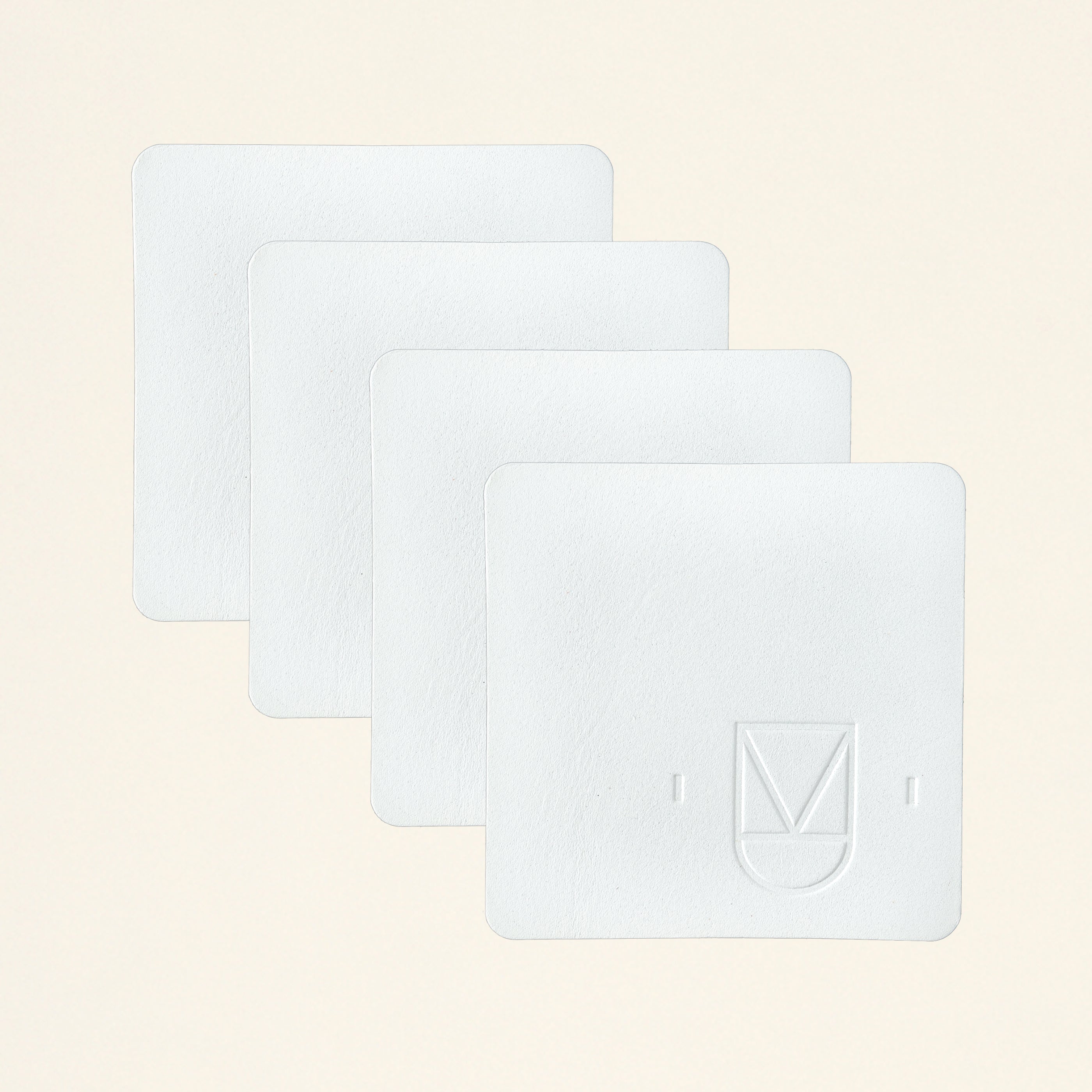 KMI White Leather Coasters Set