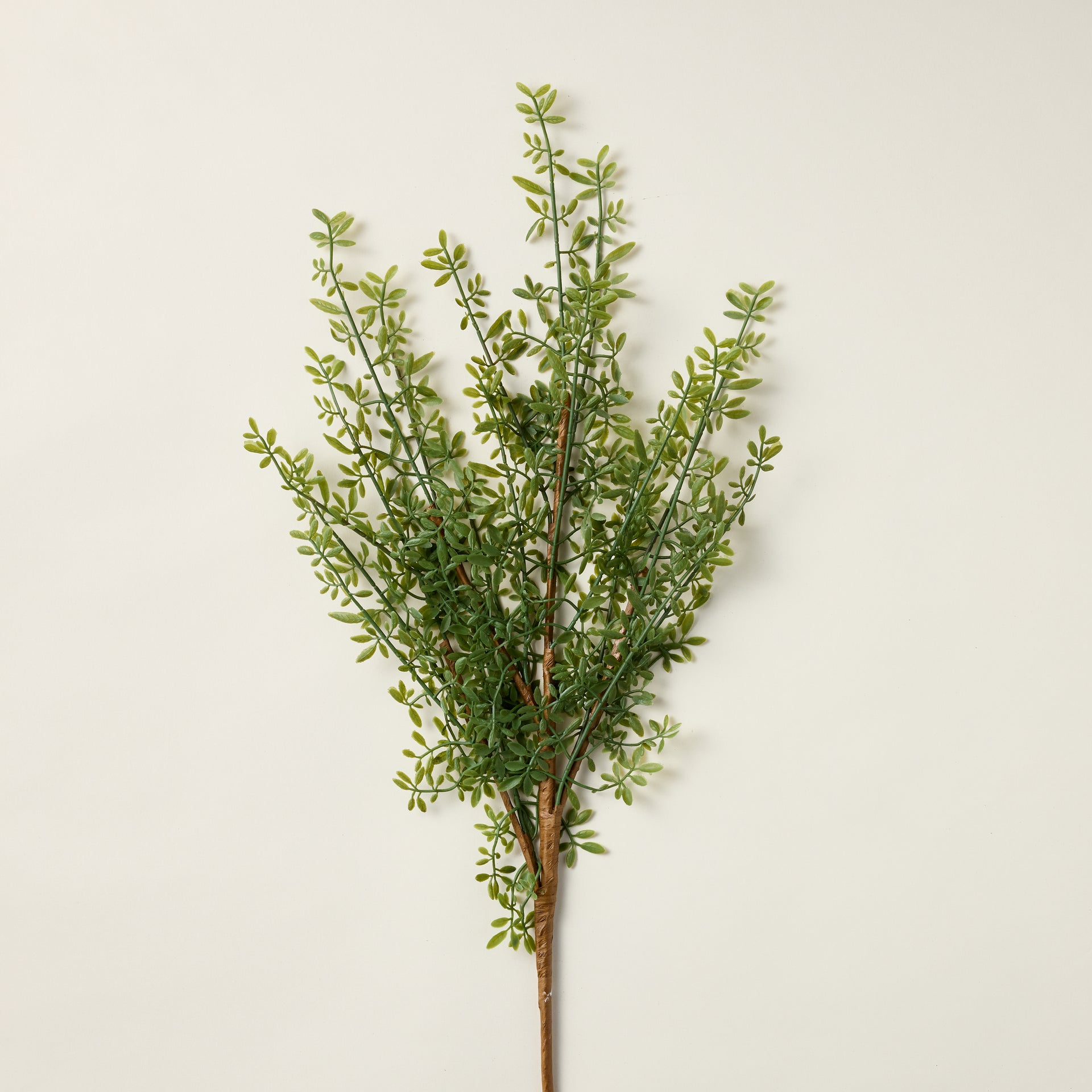 Faux myrtle leaf branch with lifelike "Real Touch" texture and vibrant green color.