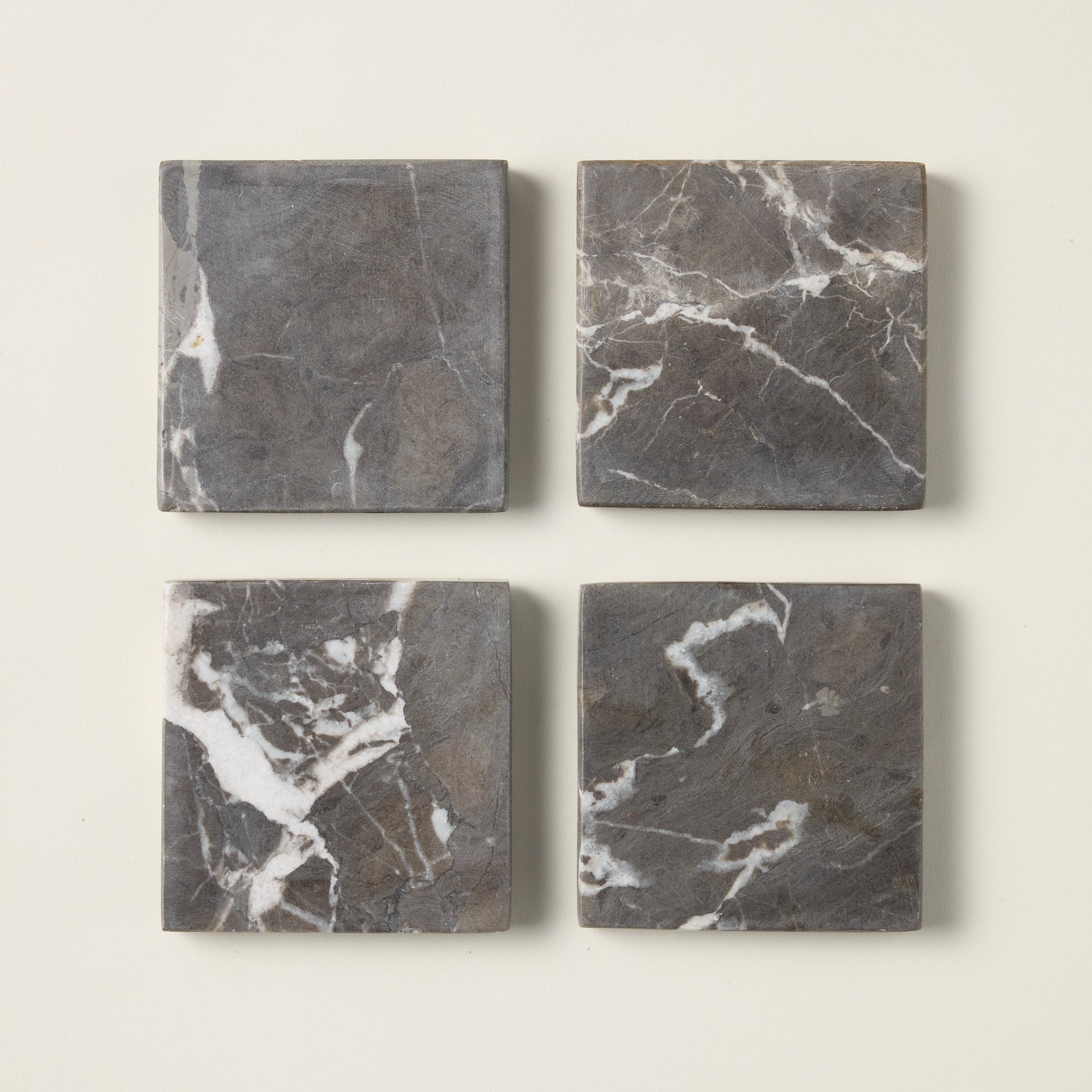 Set of ocean-inspired coasters with an artisanal design and organic texture.