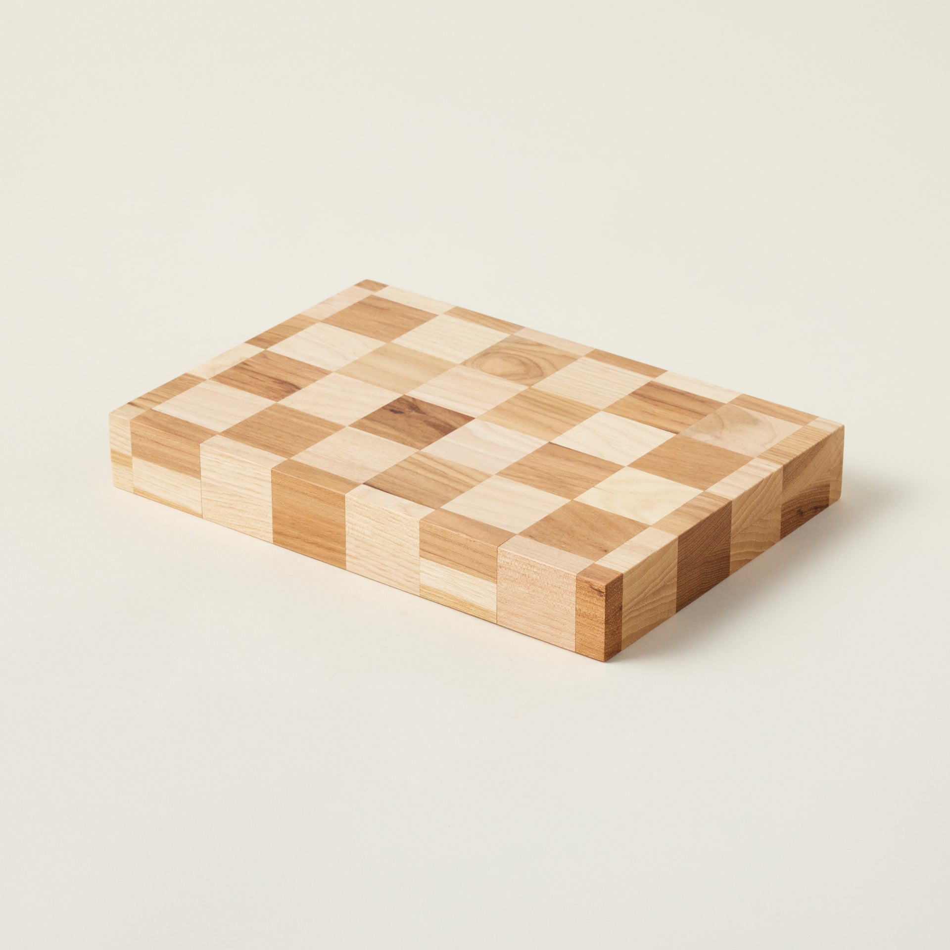 Handcrafted hickory checkerboard butcher block with a food-grade oil finish and a natural wood grain.