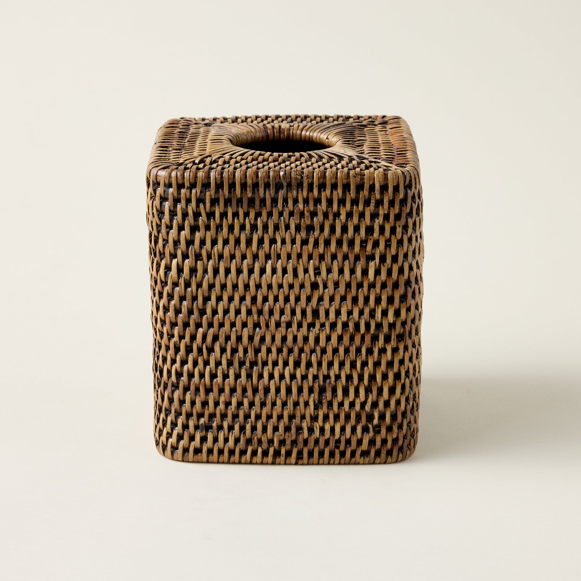 Hand-woven rattan tissue cover with a natural woven texture and a clean, elegant design.