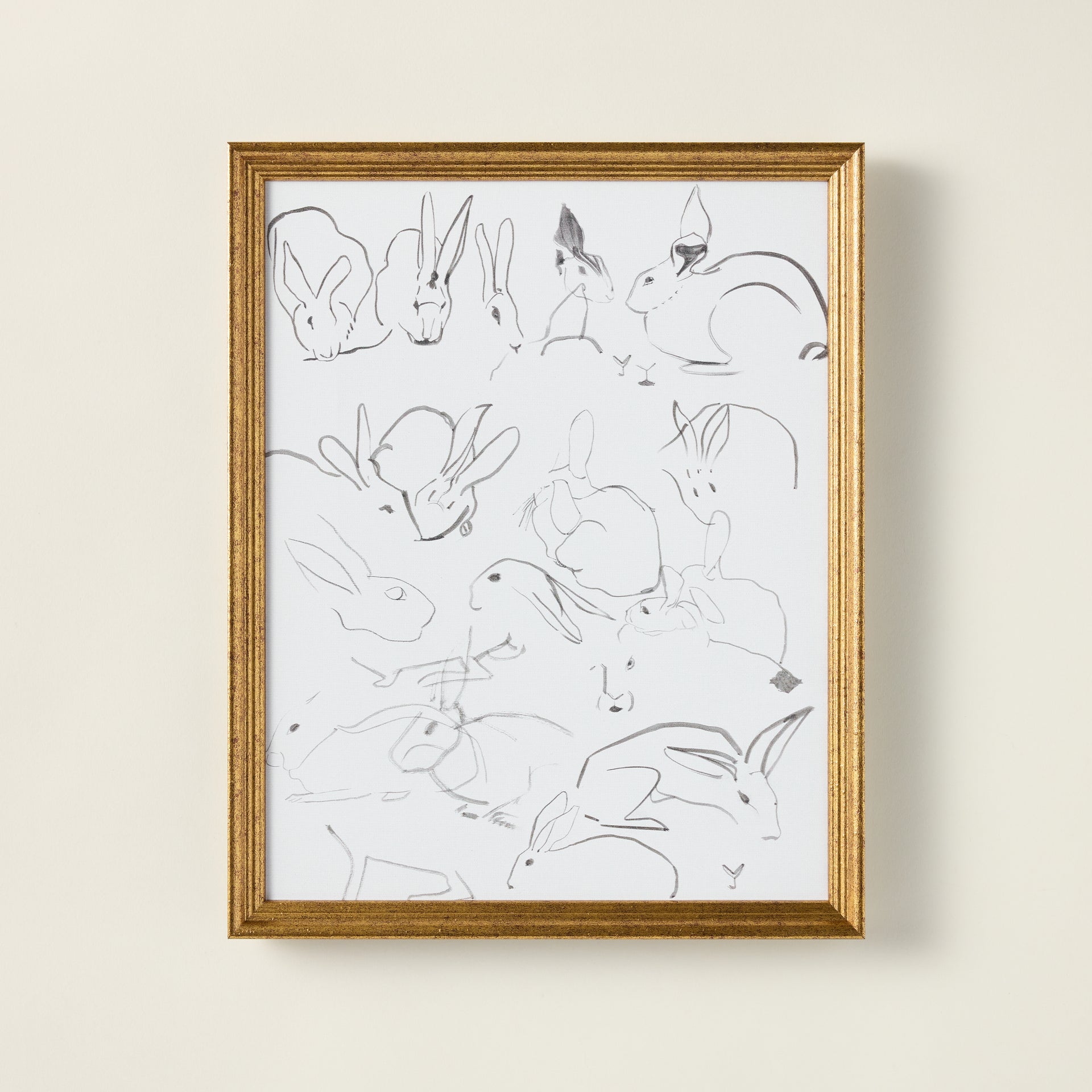 Vintage-inspired art print of sketched bunnies on a stretched canvas, featuring a distressed and aged patina.