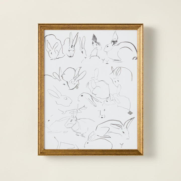 Vintage-inspired art print of sketched bunnies on a stretched canvas, featuring a distressed and aged patina.