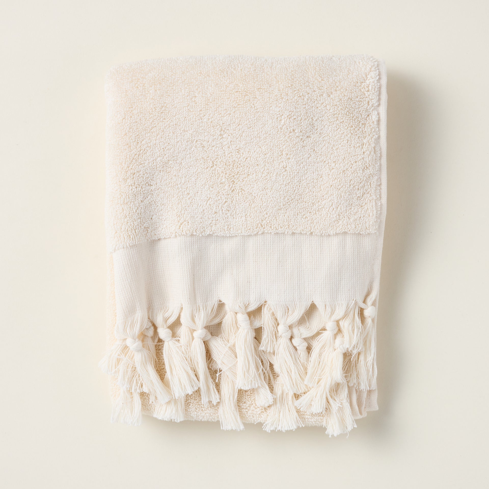 Soft terry hand towel made from 100% Turkish cotton with a delicate fringe detail.