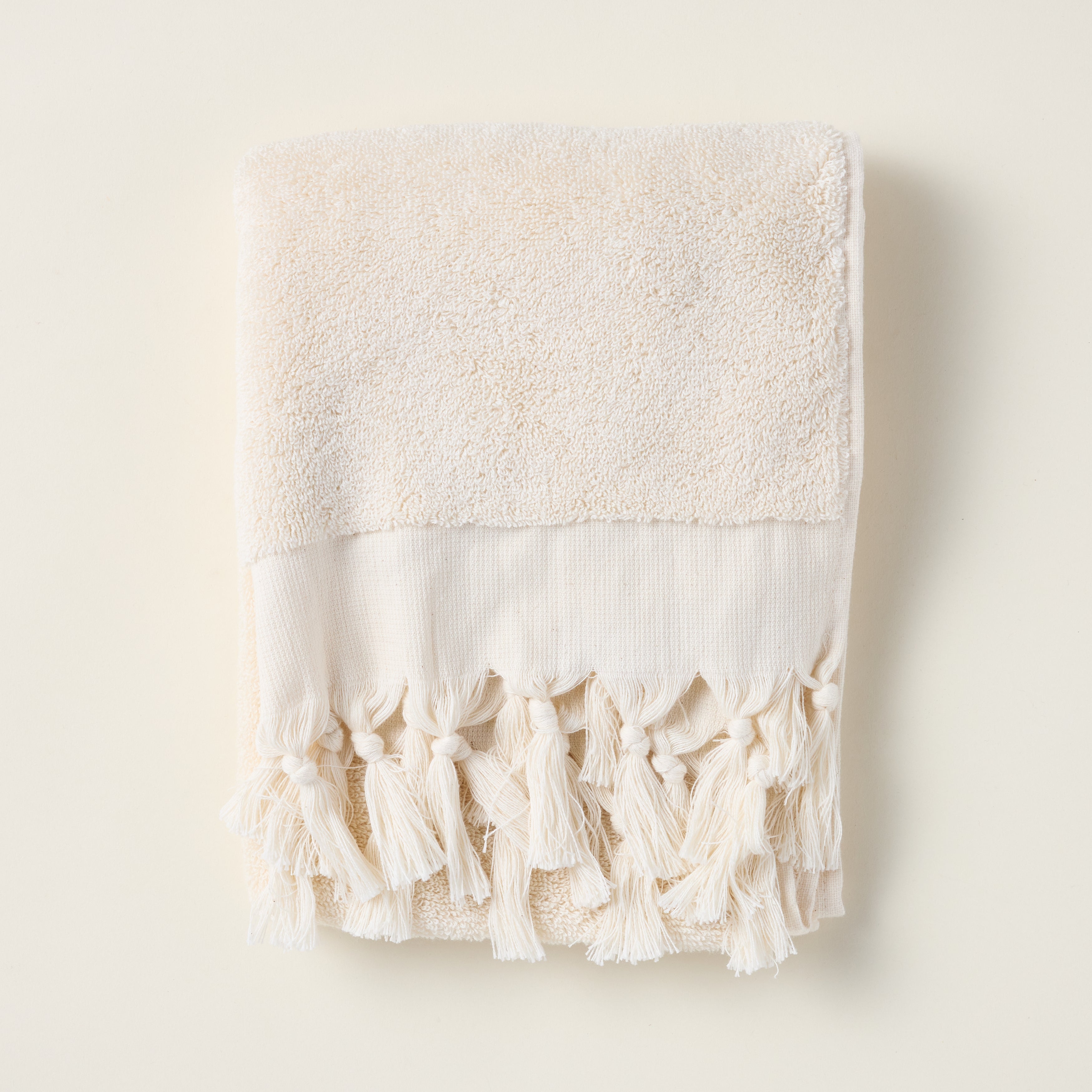 Soft terry hand towel made from 100% Turkish cotton with a delicate fringe detail.