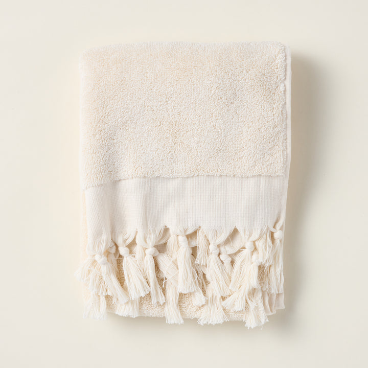 Soft terry hand towel made from 100% Turkish cotton with a delicate fringe detail.