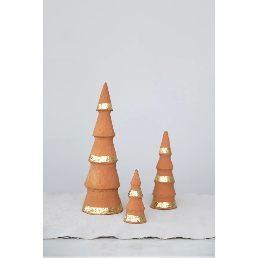 A decorative, terra-cotta colored tree made of paper mache with gold foil accents.
