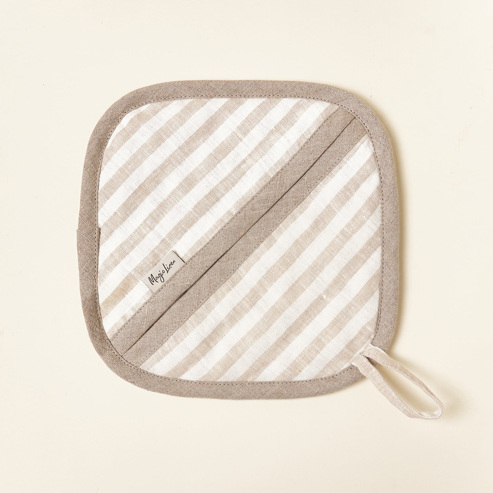 Striped linen potholder, quilted with a modern, elegant design.