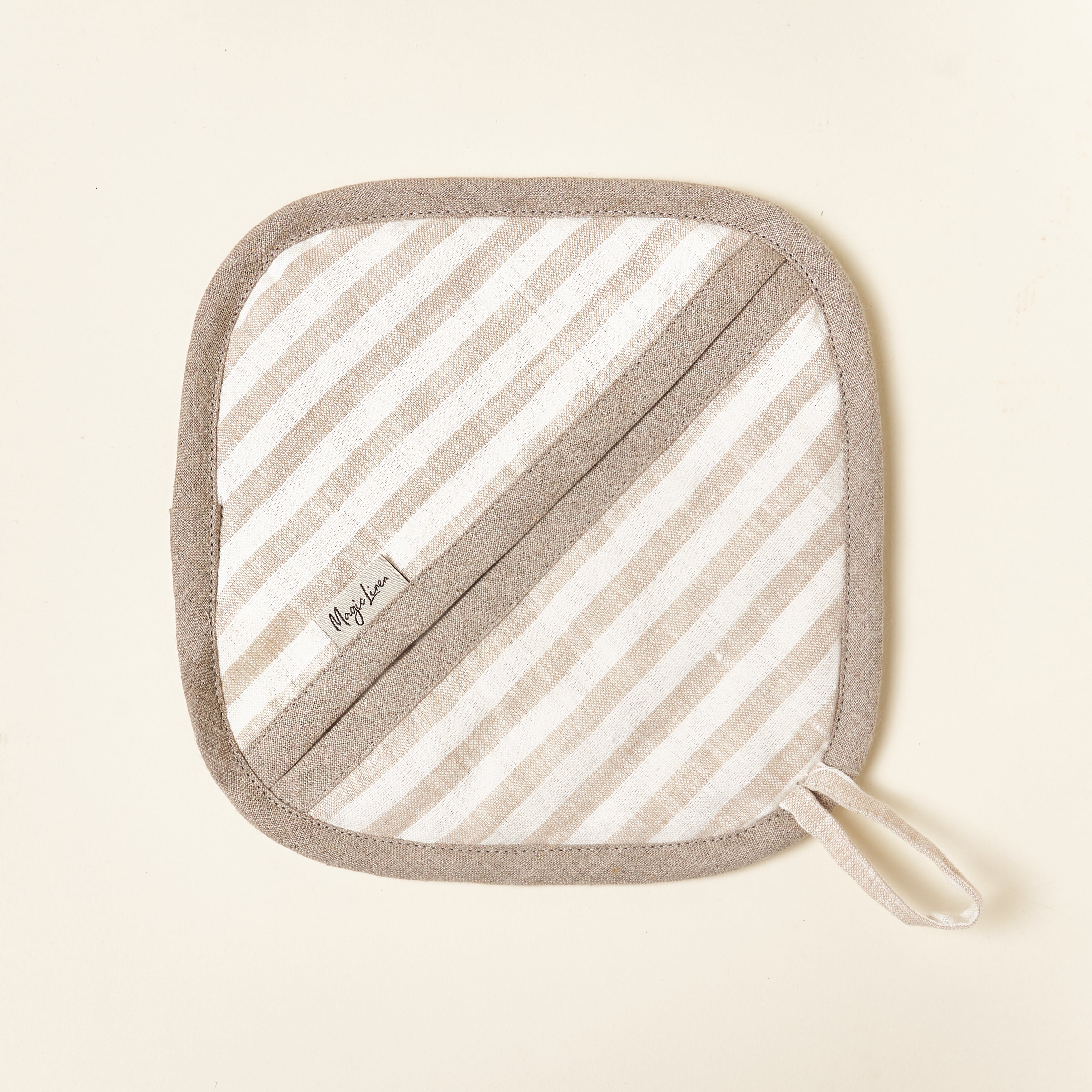 Striped linen potholder, quilted with a modern, elegant design.