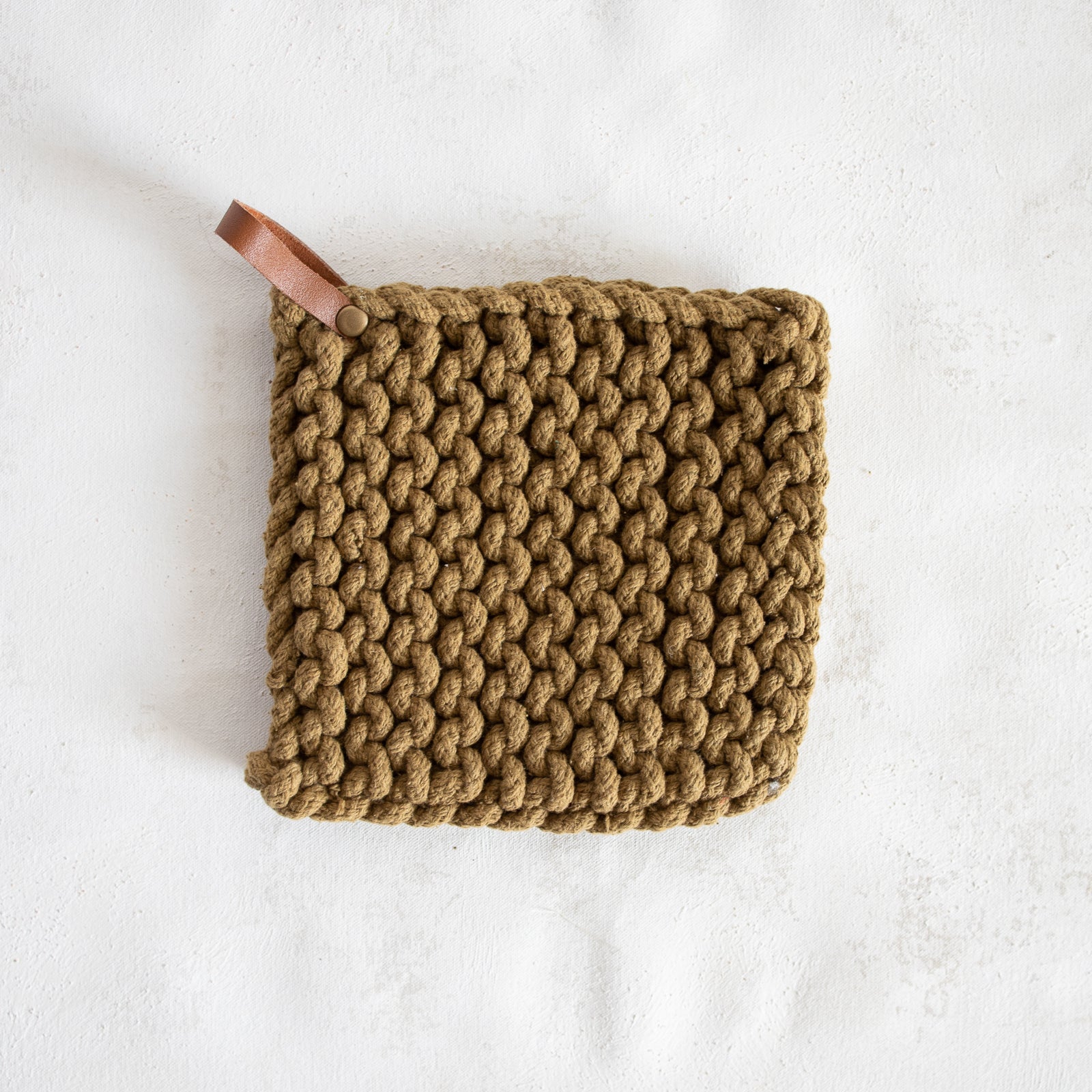 https://katemarkerhome.com/cdn/shop/products/cotton-crocheted-potholder-with-leather-loop-sand.jpg?v=1630601689